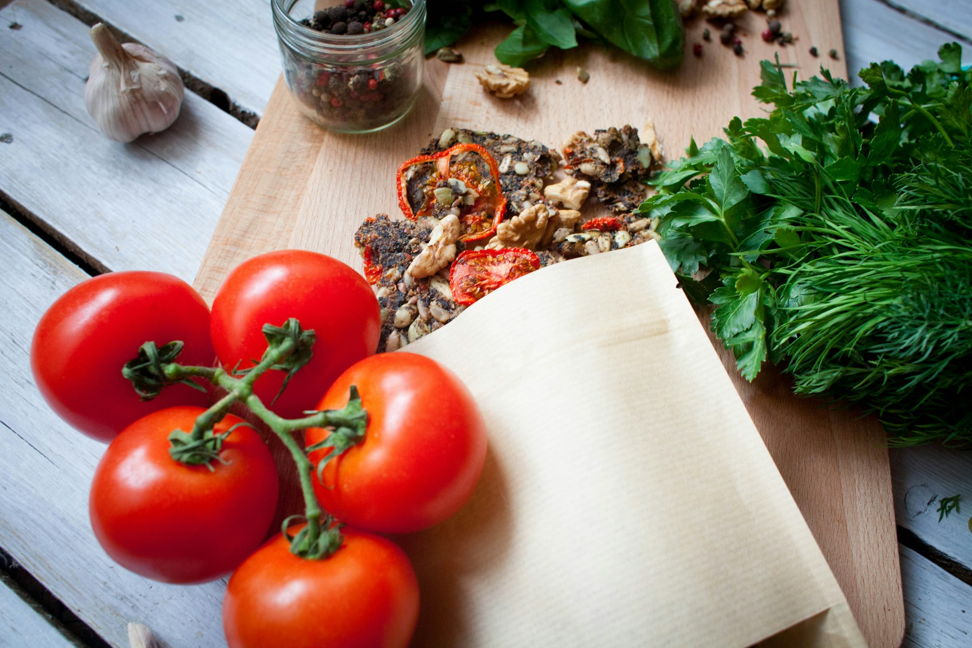 A layout for your product in an ecological craft paper pack on a cutting board with healthy food